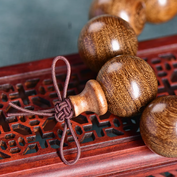 Golden Silk Nanmu Wood Bracelet: Grounding Energy, Flourishing Growth